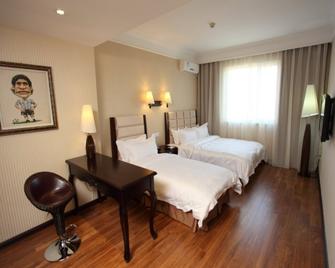 Anshan Camilla Business Hotel - Аньшань - Спальня