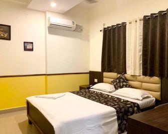 Aditi Comforts Service Apartment - Karwar - Phòng ngủ
