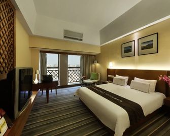 South China Laguna Hotel - שנג'ן - חדר שינה