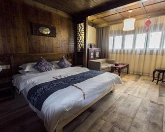 Suiyuetan Inn (Shexian Ancient City) - Huangshan - Bedroom
