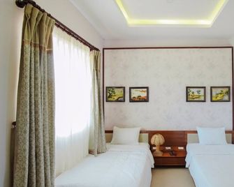 Sun & Sea Resort- Vip Unit 3 (Lagoon Vip /Garden Vip View) - Huế - Schlafzimmer