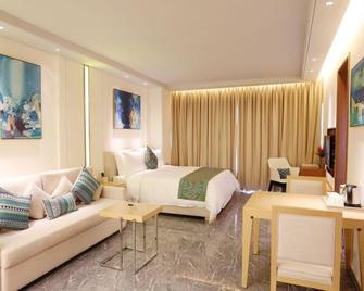 Poly Phoenix Hotel - Sanya - Schlafzimmer
