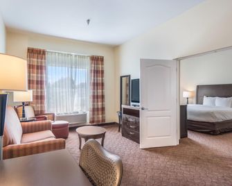 Clarion Inn and Suites Central Clearwater Beach - Clearwater - Camera da letto