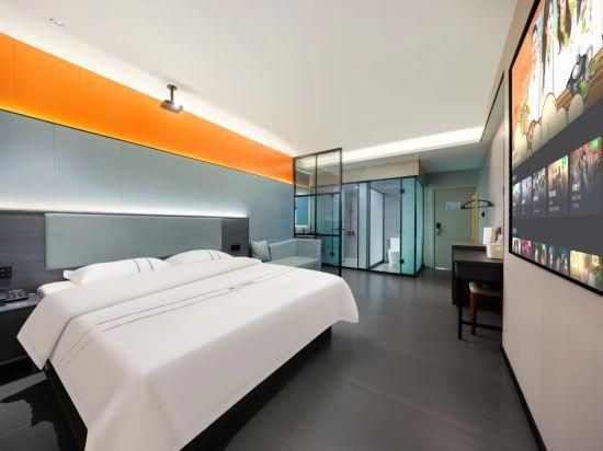 Next Wisdom Hotel - Wanning - Bedroom