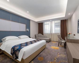 Zhongshan Huangcheng Louis Hotel - Zhongshan - Ložnice