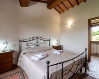 Pugnano Alto -appartamento Castagna - Lisciano Niccone - Habitación