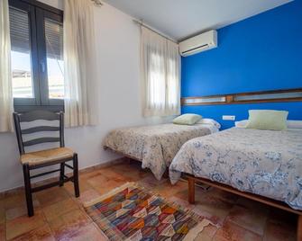 Apartamentos Montesclaros - Granada - Habitació