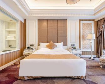 Da Tong Weidu International Hotel - דאטונג - חדר שינה