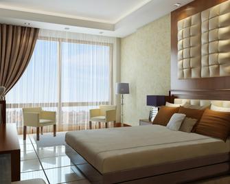 Kin Plaza Arjaan by Rotana - Kinshasa - Camera da letto