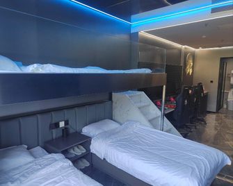 Giant Snail Esports Hotel - Liaoyang - Bedroom
