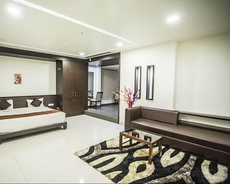 Aadya Inn - Attibele - Bedroom
