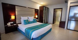 Nine Tree Luxury Hotel & Suites Lahore - Lahore - Bedroom