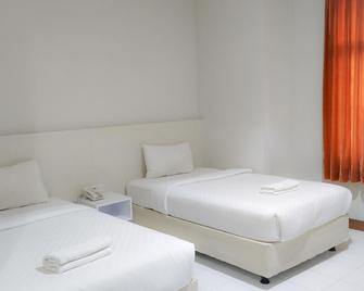 Twin Star Hotel - Surakarta City - Bedroom