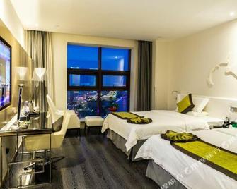 Ace International Hotel - Hanzhong - Bedroom