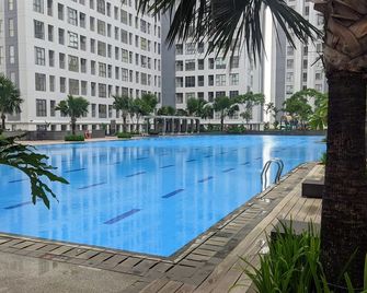 Well Designed and Comfy 2BR Apartment at M-Town Residence - Curug - Pool