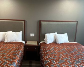 Royal Motel Tracy - Tracy - Schlafzimmer