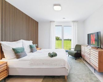 The Serviced - Design Apartments - Stuttgart - Schlafzimmer