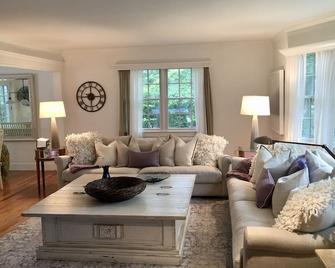 Swim in a sea of hydrangeas on this peaceful, bucolic property. - Water Mill - Living room