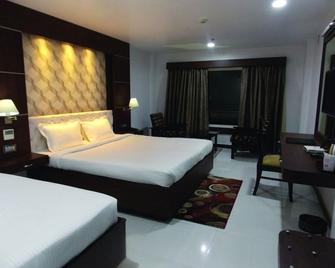 Airport City Hotel - Calcuta - Habitación