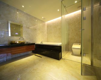 First Hotel - Guri - Sala de estar