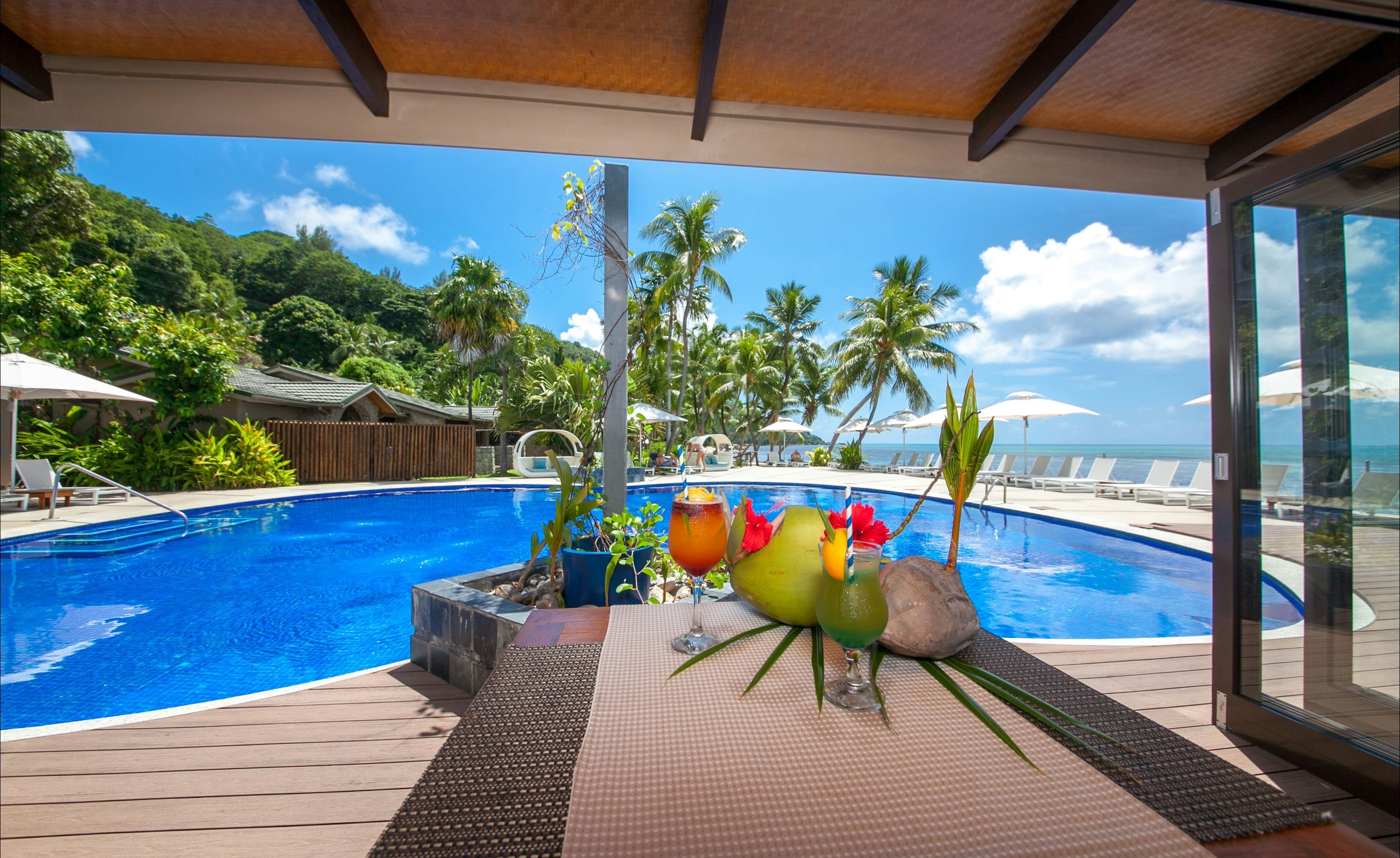 كوكو دو مير هوتيل آند بلاك باروت سويتس - Grand'Anse Praslin - حوض السباحة