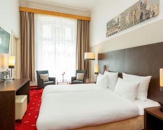 Leonardo Hotel Berlin Ku'damm - Berlin - Schlafzimmer