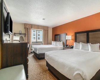 Days Inn & Suites by Wyndham Traverse City - Traverse City - Schlafzimmer