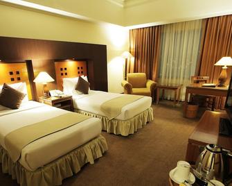 Oasis Amir Hotel - Jakarta - Bedroom