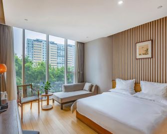 Hesuoyou Hotel Beijing - Πεκίνο - Κρεβατοκάμαρα