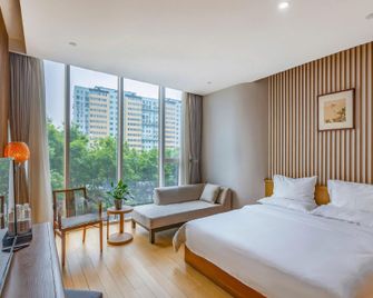 Hesuoyou Hotel Beijing - Pekín - Habitación