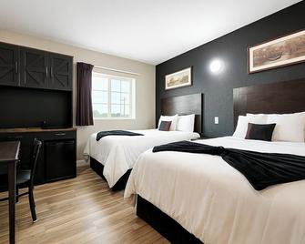 Hotel Dilley Grand - Dilley - Bedroom