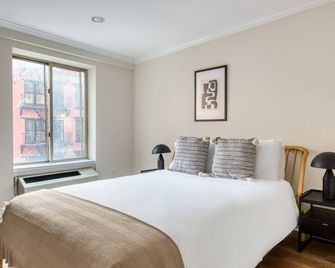 Amazing Nolita 2BR w/ Elevator & Roof, nr SoHo, by Blueground - ניו יורק - חדר שינה