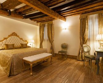 فندق أل بونته موكينيغو - البندقية - غرفة نوم