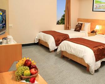 Hoppers Stop Yelahanka - באנגאלור - חדר שינה