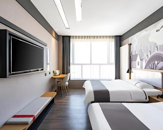 Uplus Hotel Hebei Cangzhou Qing County Nanhuan Road - Cangzhou - Bedroom