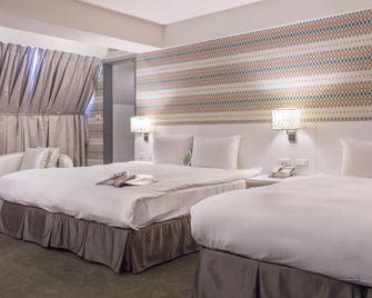 زيمين سيتيزين هوتل - مدينة تايبيه - غرفة نوم