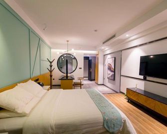 Q+ Mantingfang Inn (Zhangjiajie Railway Station Tianmenshan) - Zhangjiajie - Chambre