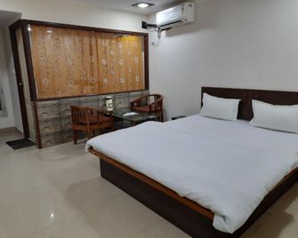 Goroomgo Heavens Guest House Haridwar - Haridwar - Bedroom