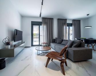 Heritage Boutique Apartments - Athens - Living room