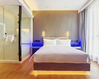 Beijing Mooncome Hotel - Peking - Schlafzimmer