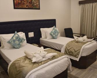Kyriad Sarvesh Gangavathi Hampi - Hampi - Bedroom