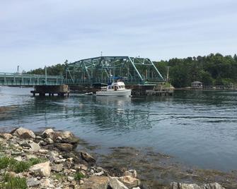 Updated Cottage on Water’s Edge with Deepwater Boat Dock - Southport