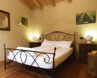 Agritur Maso Carpene - Isera - Schlafzimmer