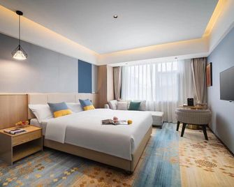 Lexiang. Smart Audio-Visual Boutique Stay (Changle International Airport) - Фужоу - Спальня