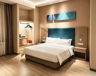 Home Inn Style Harbin Songbei Wanda Tourism City Ice And Snow World - Harbin - Slaapkamer