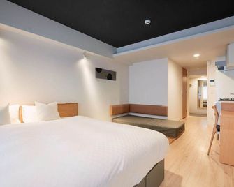Residential Hotel Hare Shin-Osaka - أوساكا - غرفة نوم