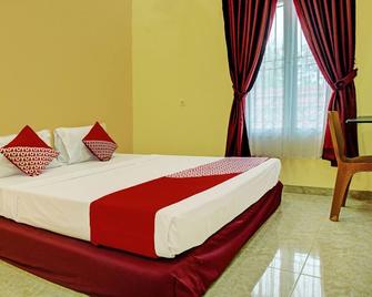 OYO 92293 Pahala Syariah Residence - Prabumulih - Habitación