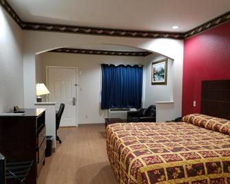 سكوت إن سويتس - داون تاون هيوستون - هيوستن - غرفة نوم