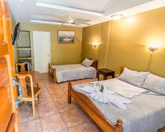 Le Priss Inn - Quepos - Camera da letto
