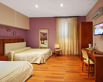 هوتل تونيك - باليرمو - غرفة نوم